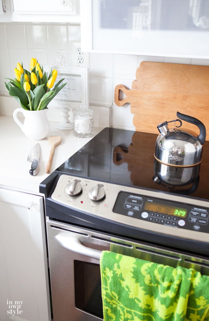 Yellow tulips on Kitchen decorating with wood bread boards. 