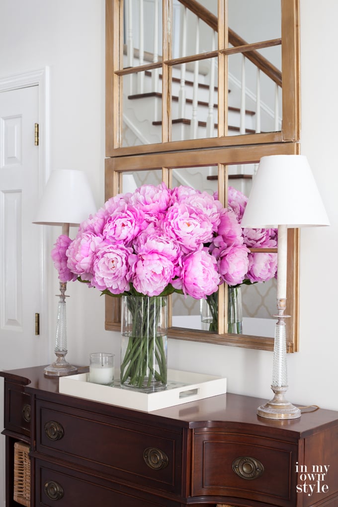 Decorating ideas using fake flowers. Pink Peonies from Crate and Barrel