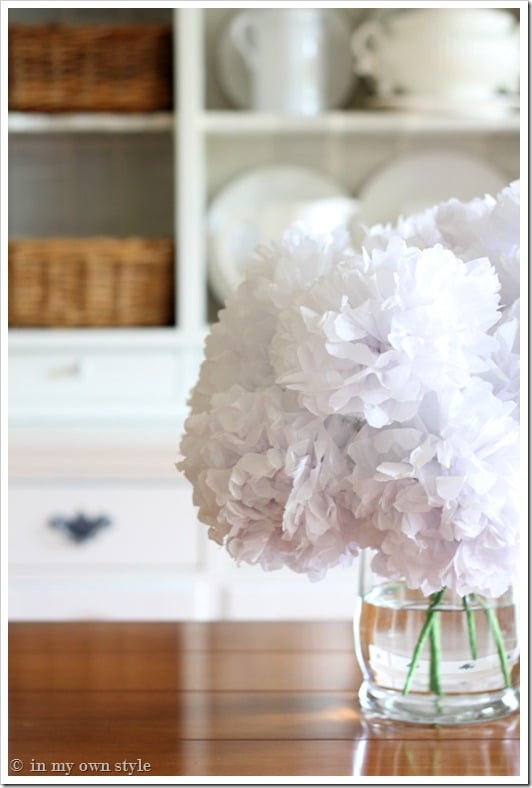 How to make your own fake flowers using tissue paper and dollar store items.