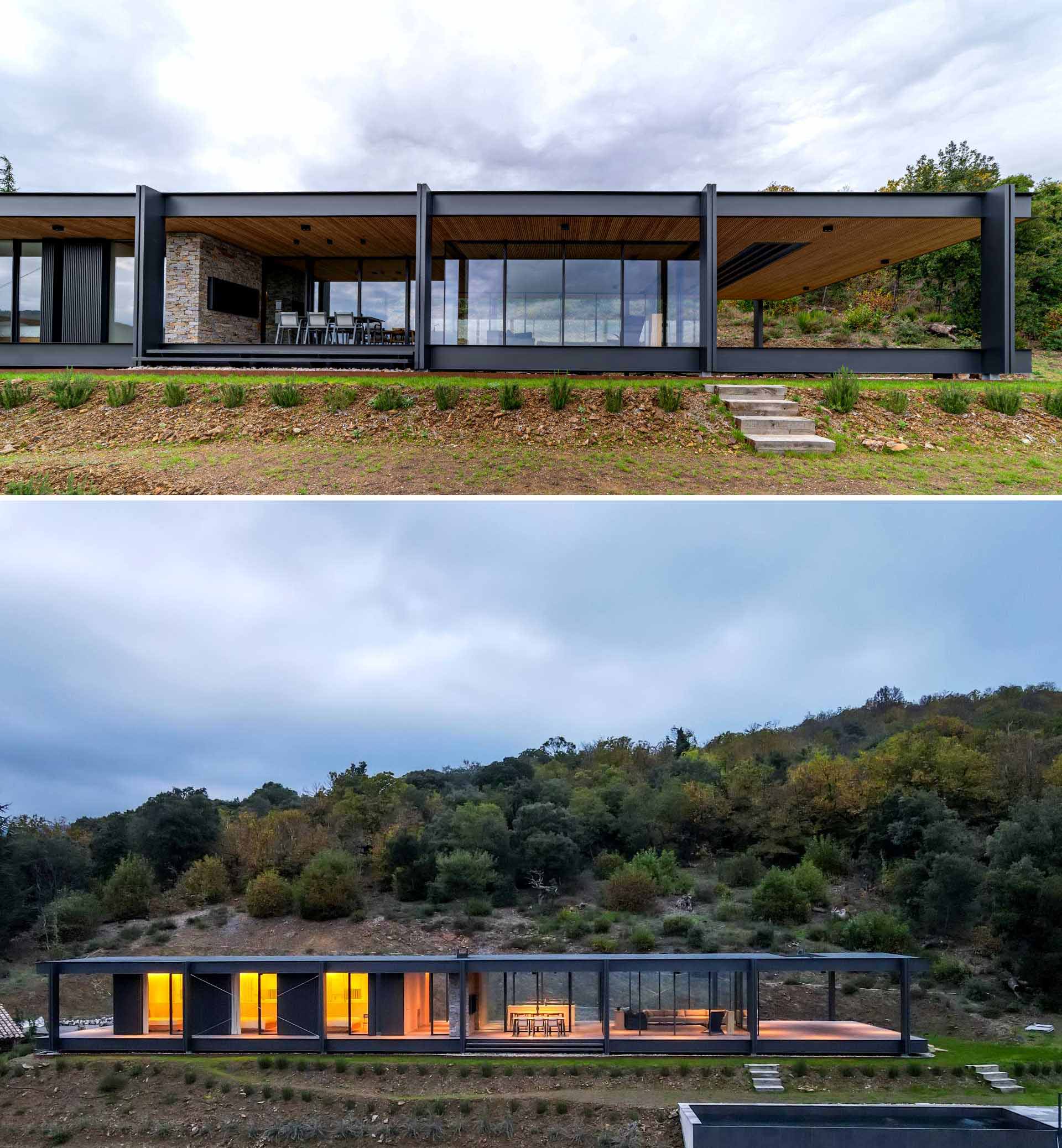 A modern house with a horizontal layout, walls of glass, and an exposed steel structure.