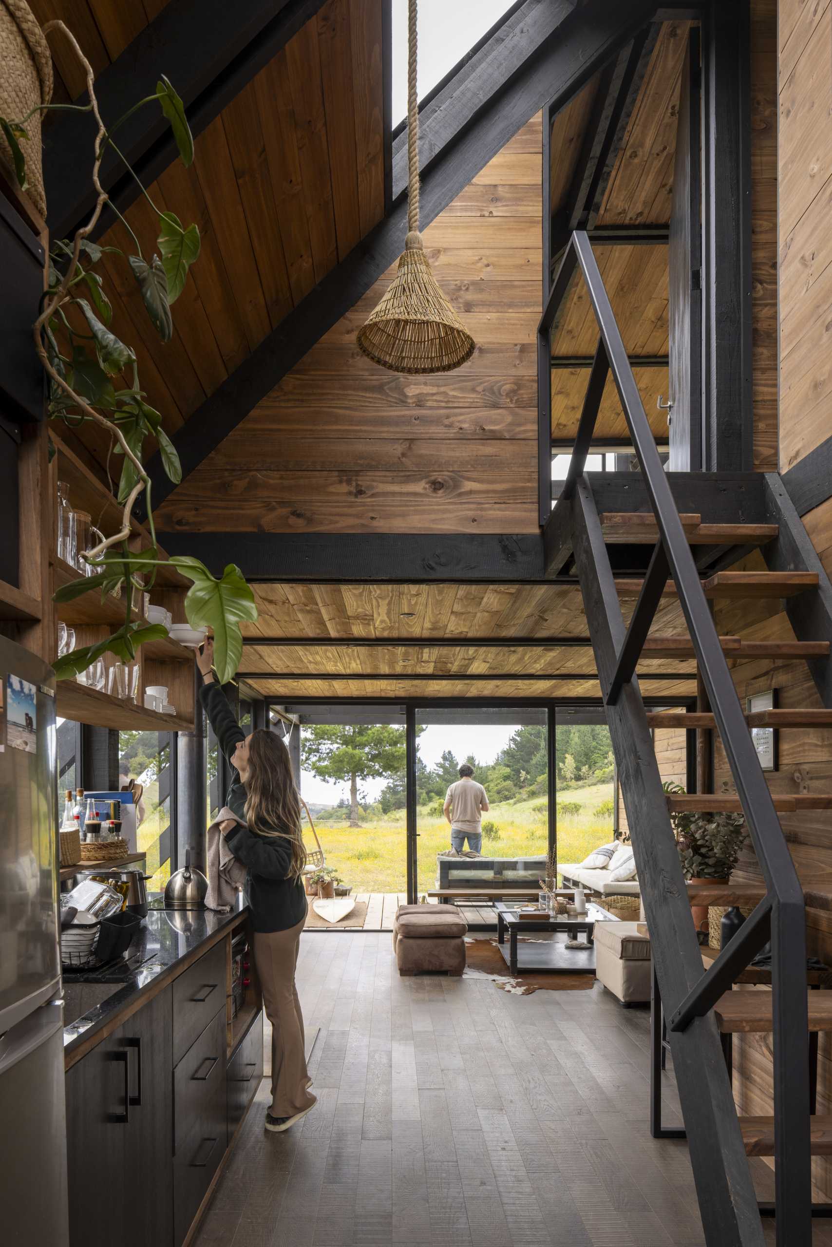 The kitchen of a small wedge-shaped home.