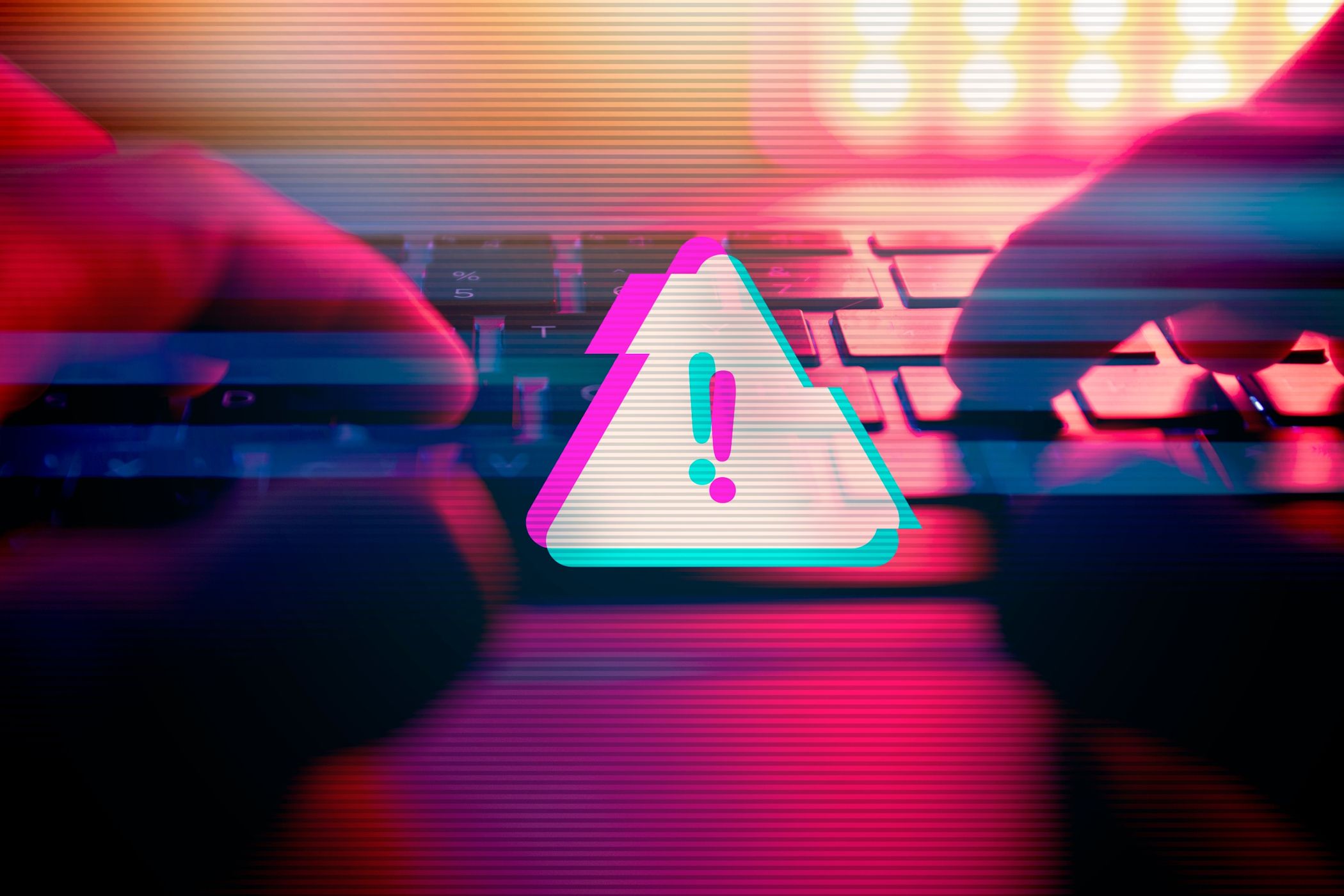 person using laptop with large malware warning