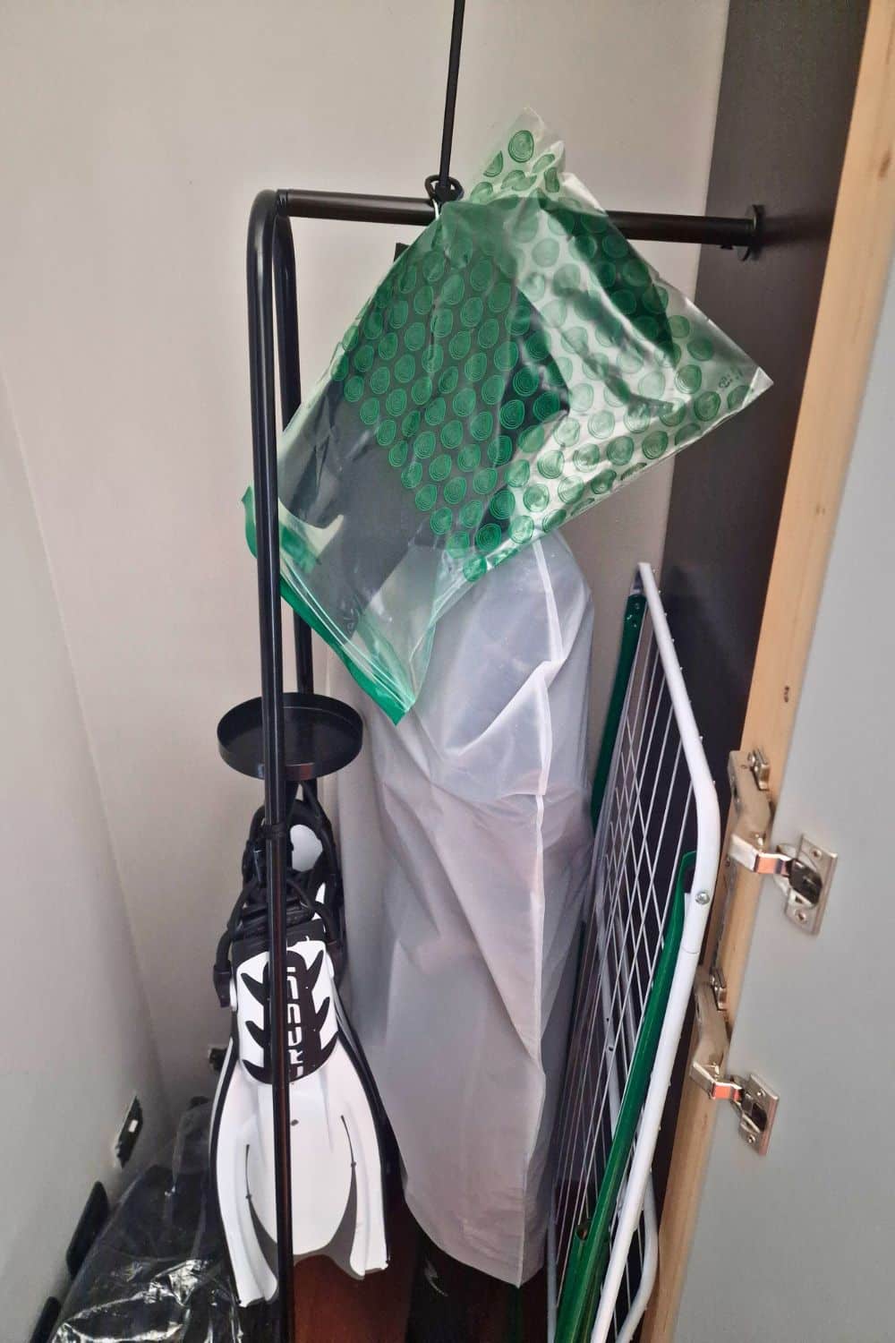 The Surprisingly Stylish Way to Dry Your Wetsuit in a Tiny Apartment 17 wetsuit drying rack and storage rack