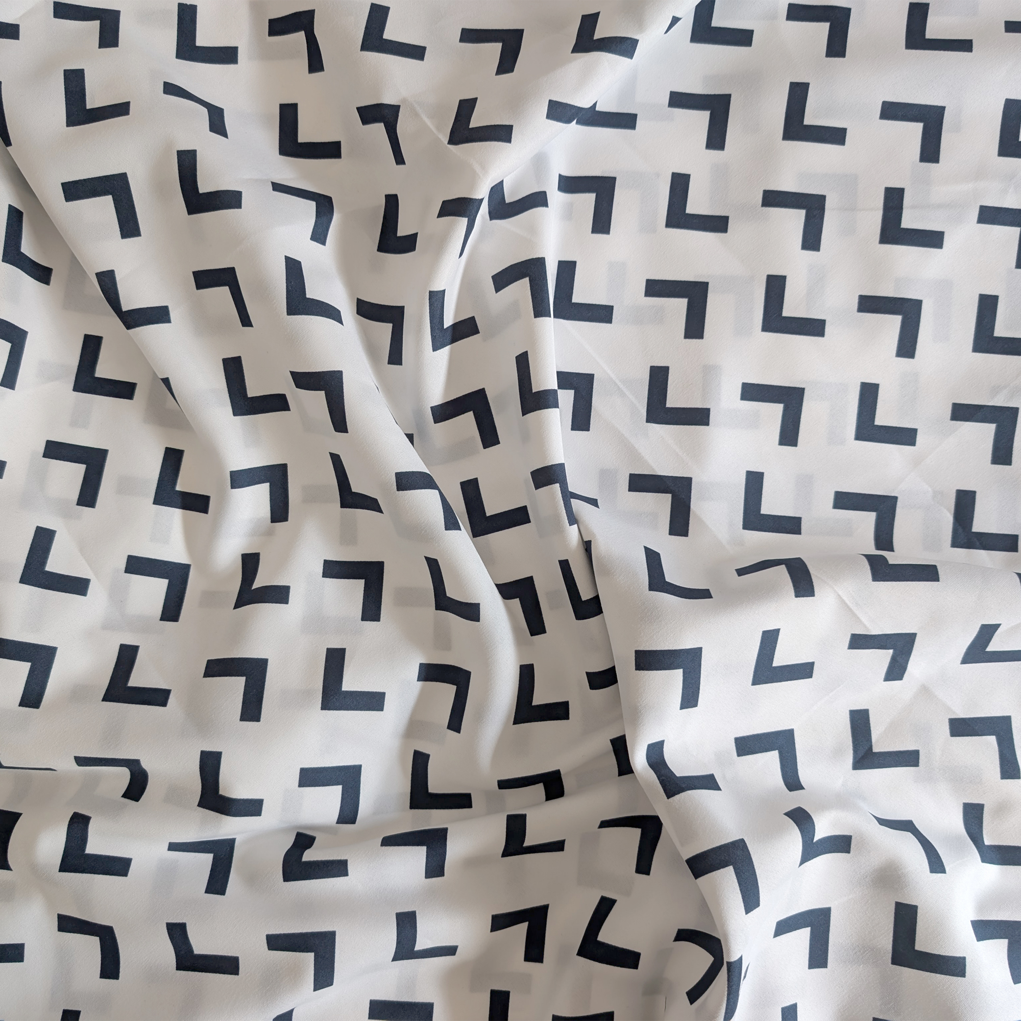 Amazon Utopia duvet set with a white background and navy arrows