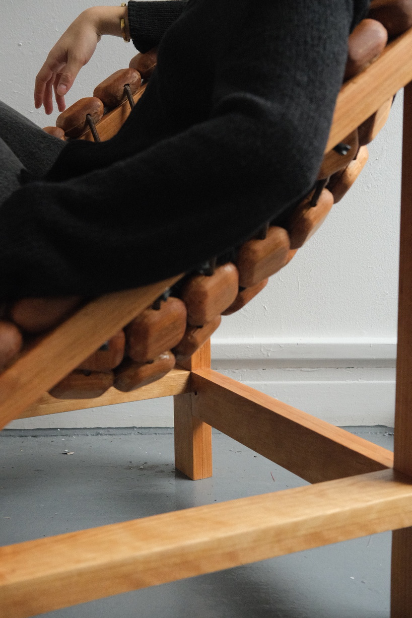 molten chair's cherry hardwood beads wrap around the body