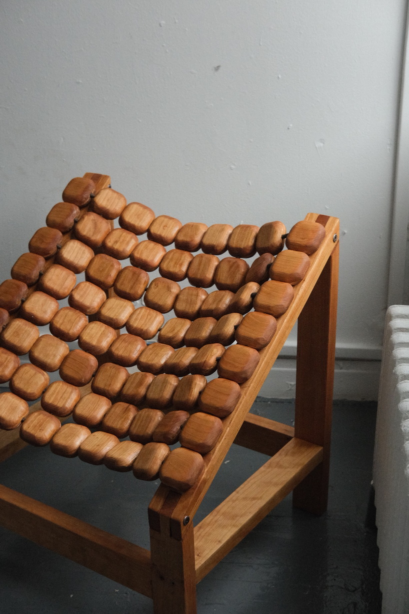 molten chair's cherry hardwood beads wrap around the body