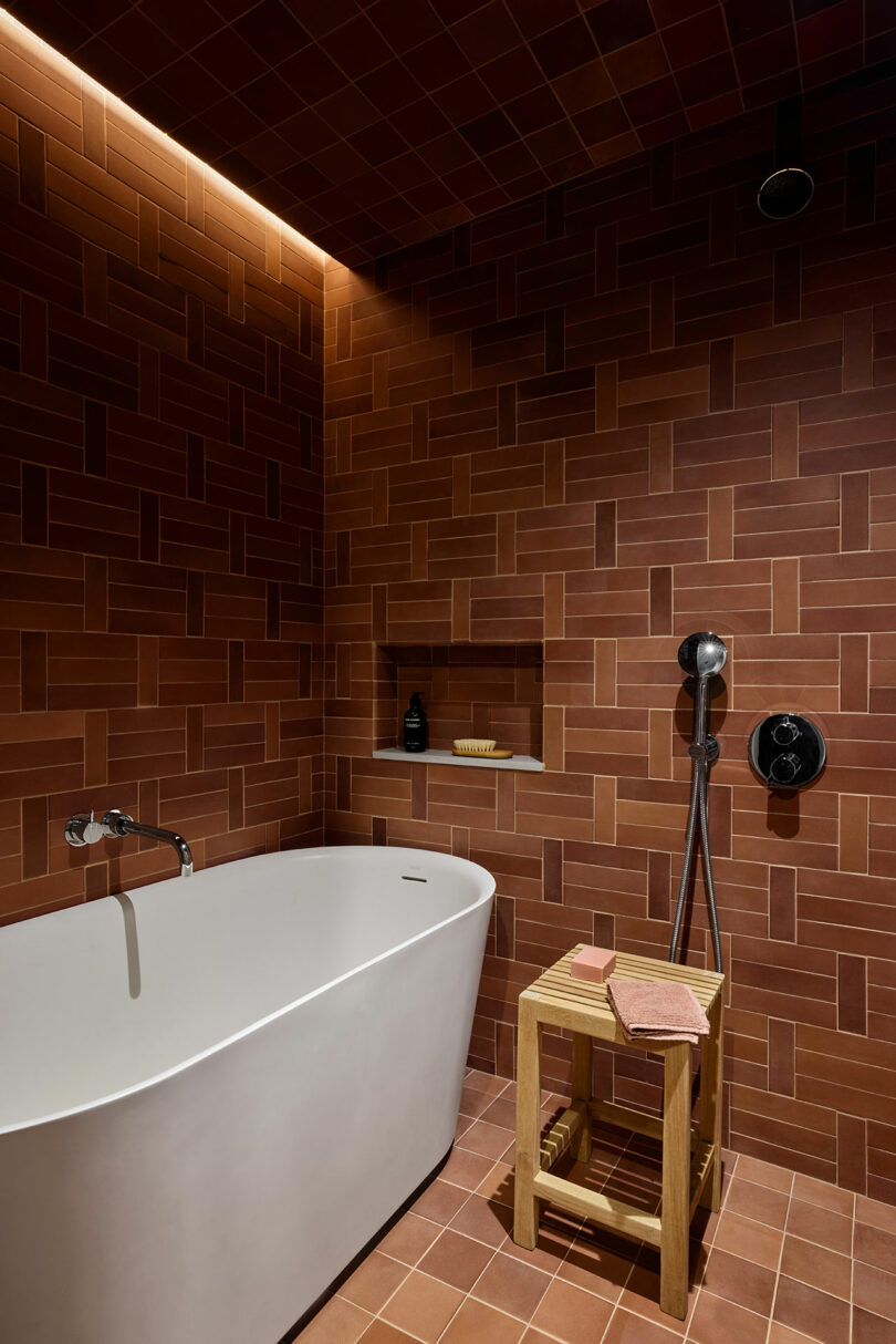 A bathtub in a bathroom.