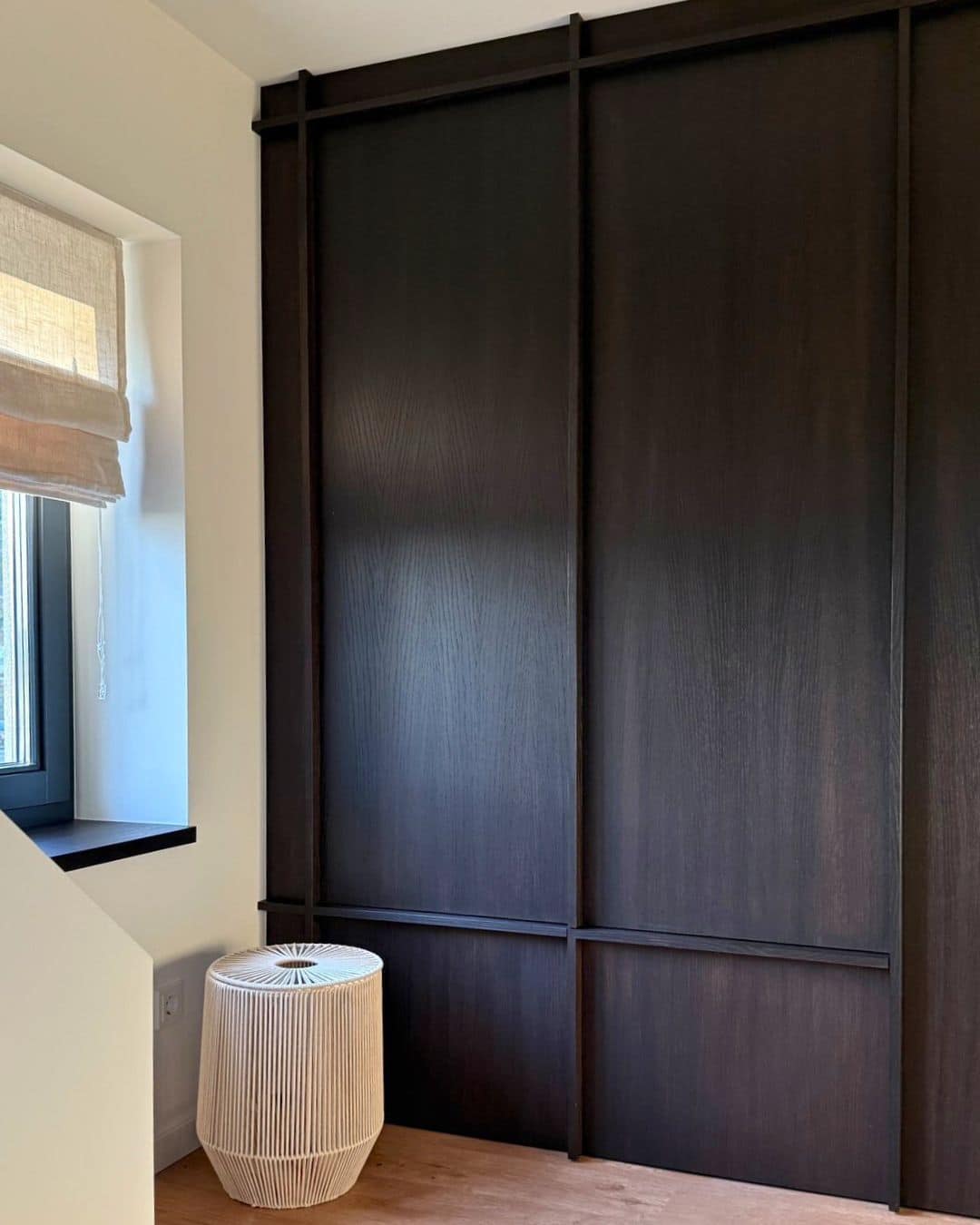 Peek-a-Boo Laundry: Hide Your Washer + Dryer in Plain Sight 15 IKEA Kitchen cabinet black brown with raised edge profile handles, tall cabinets above drawers