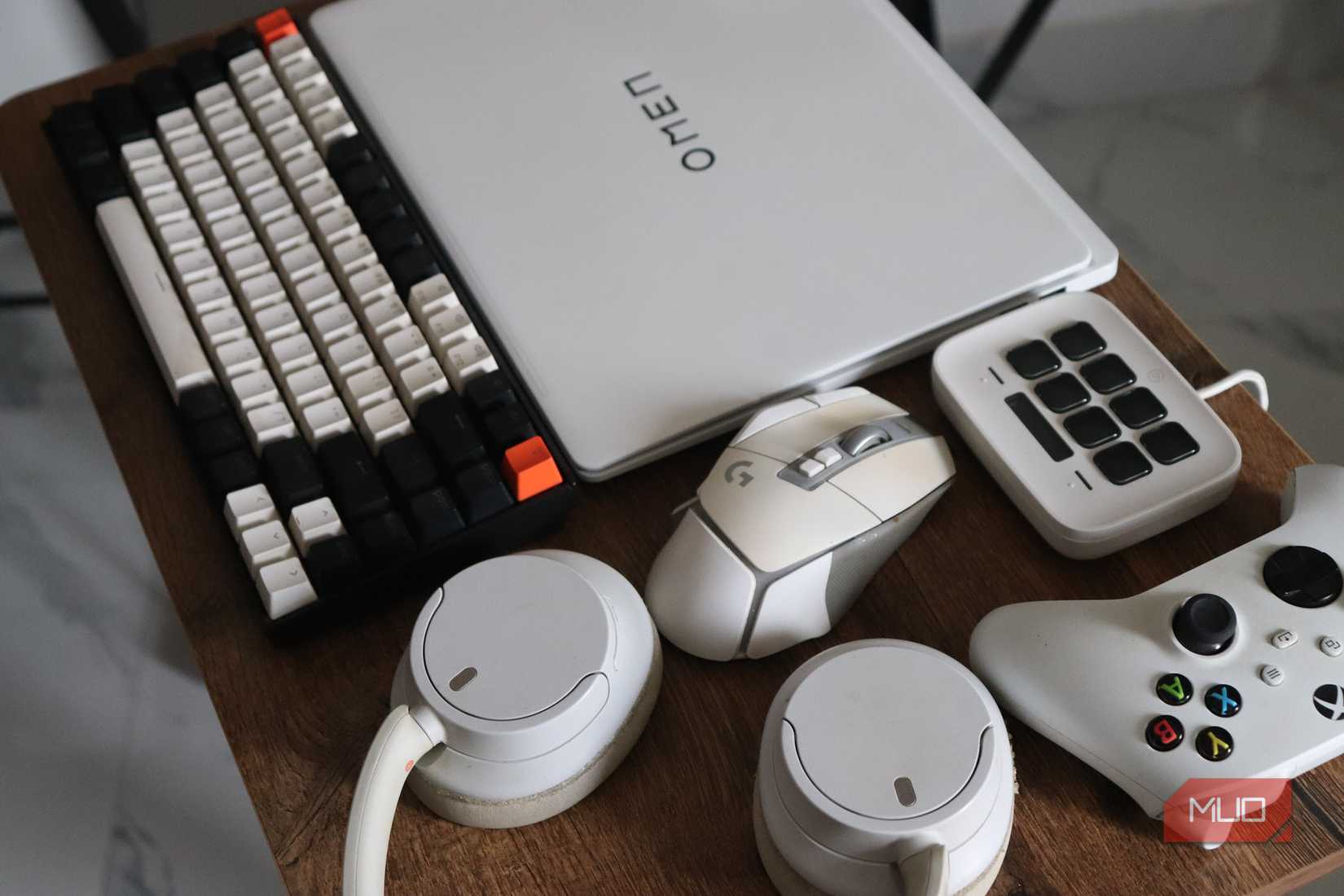 White PC hardware laid out on a table