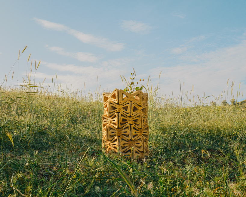 3D printed interlocking bricks compose earthen microclimate shelter for tree saplings