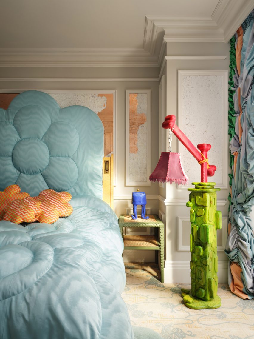 Bed with unusual green bedtable