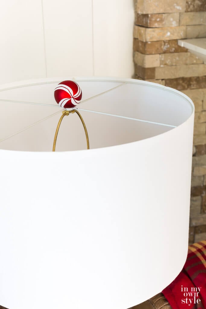 Christmas lamp finial DIY idea showing a red and white ornament.