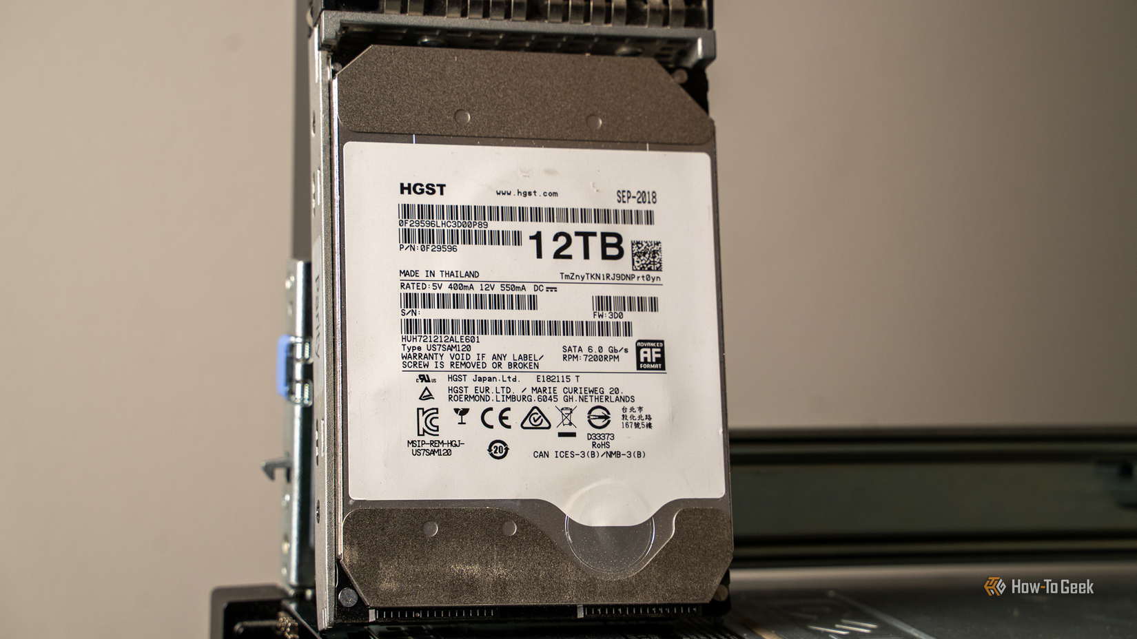 A HGST 12TB Helium recertified hard drive.